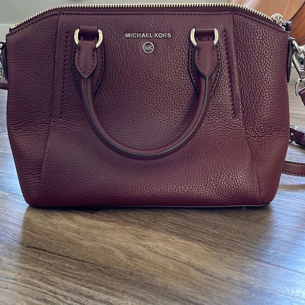 Michael Kors cranberry purse. Shoulder and tote options